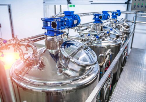 Dairy factory with milk pasteurization tank and pipes
